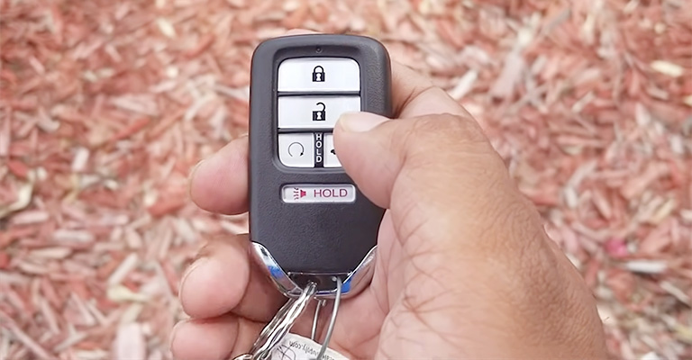 Que puis-je faire avec mon porte-clés Honda ?
